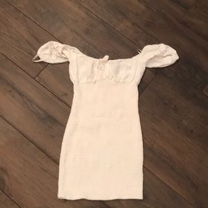 white bodycon off the shoulder minidress